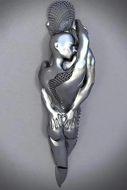 Metallic sculpture of a figure holding a sphere against a gray background