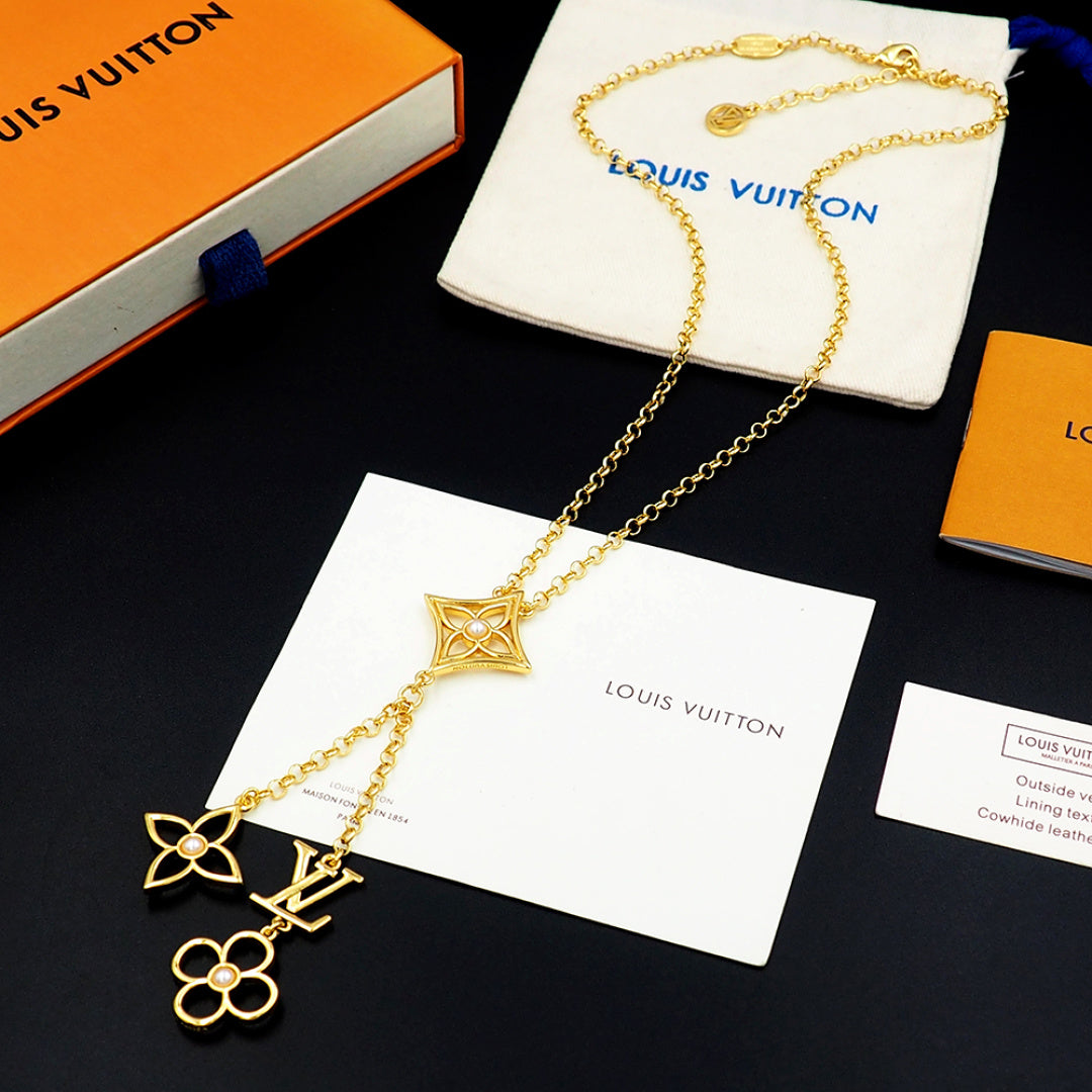Louis Vuitton Monogram Pendant Necklace, Gold-Tone Chain with LV Floral Charm, Women's Luxury Jewelry