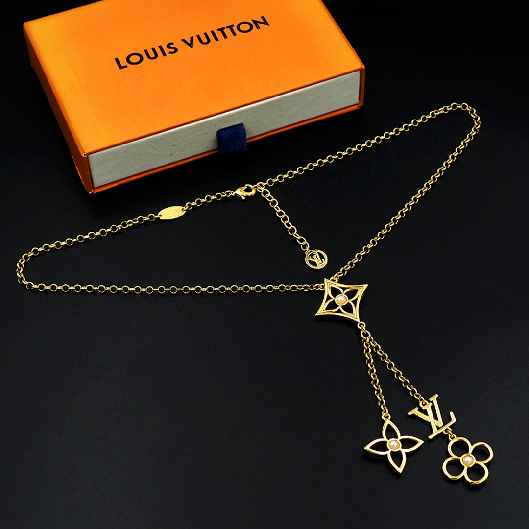 Louis Vuitton Monogram Pendant Necklace, Gold-Tone Chain with LV Floral Charm, Women's Luxury Jewelry