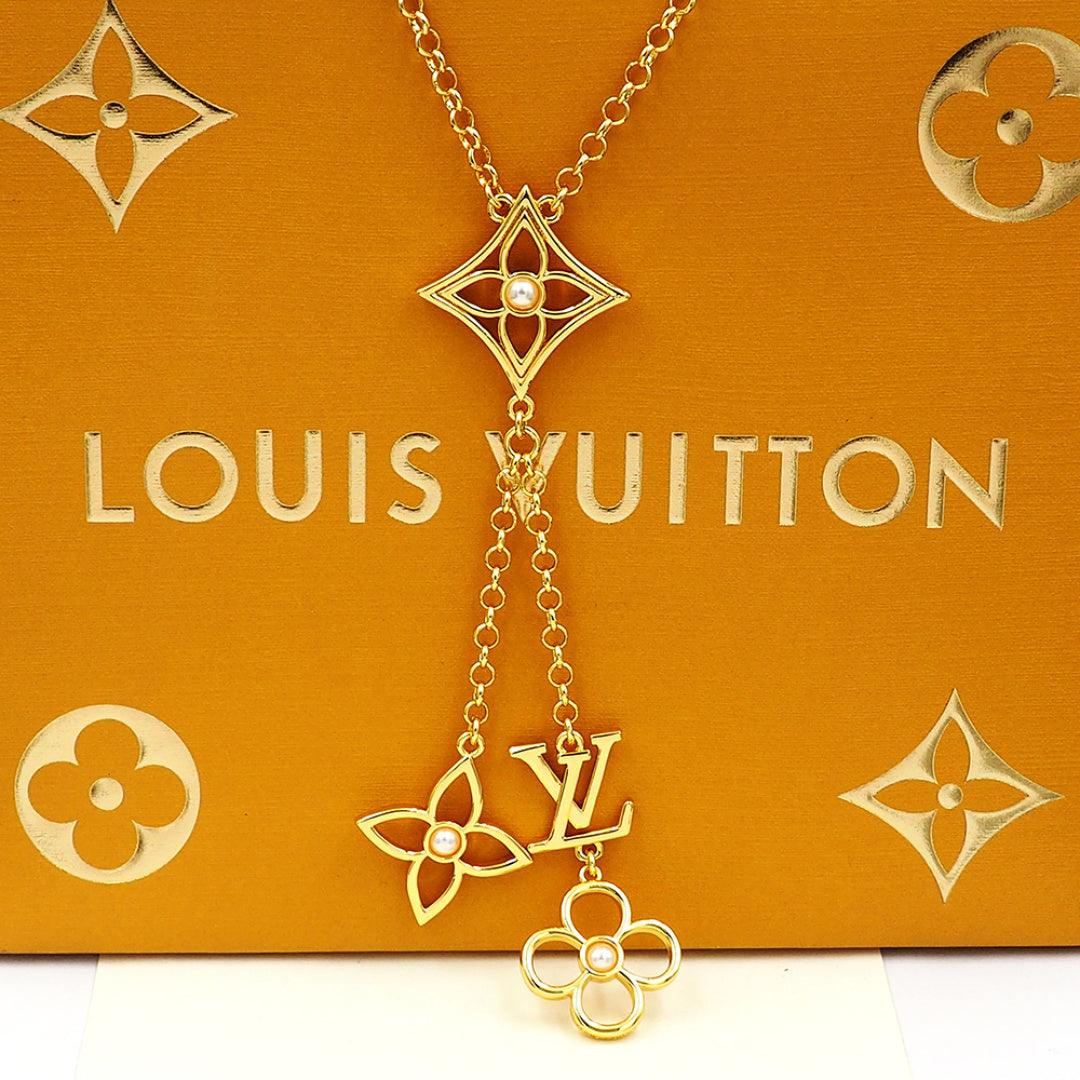 Louis Vuitton Monogram Pendant Necklace, Gold-Tone Chain with LV Floral Charm, Women's Luxury Jewelry
