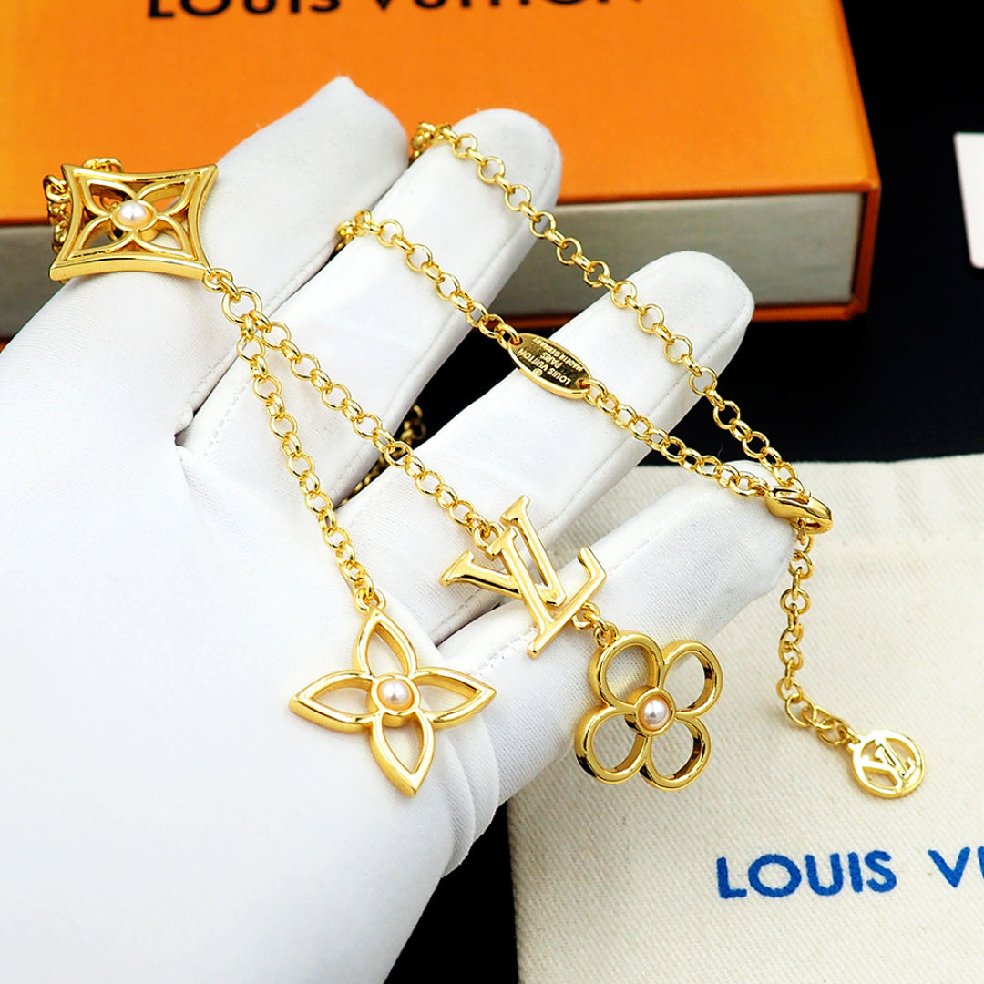 Louis Vuitton Monogram Pendant Necklace, Gold-Tone Chain with LV Floral Charm, Women's Luxury Jewelry