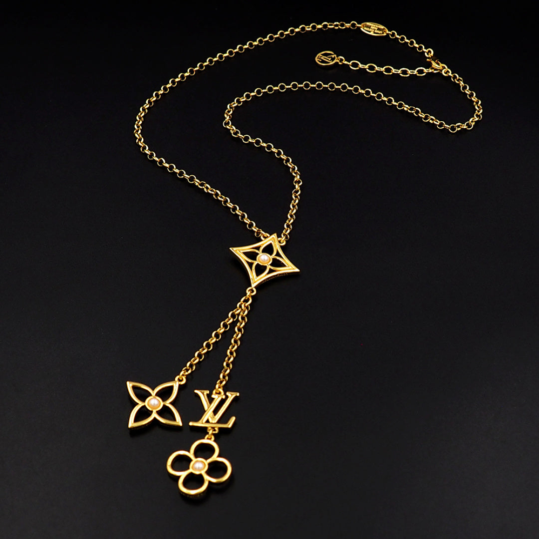 Louis Vuitton Monogram Pendant Necklace, Gold-Tone Chain with LV Floral Charm, Women's Luxury Jewelry
